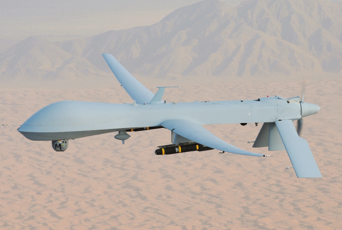 An MQ-1 Predator, armed with AGM-114 Hellfire missiles, piloted by Lt. Col. Scott Miller on a combat mission over southern Afghanistan. (U.S. Air Force Photo / Lt. Col. Leslie Pratt)