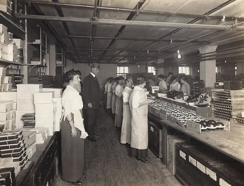 Image of a FDA official inspecting a candy factory c. 1911