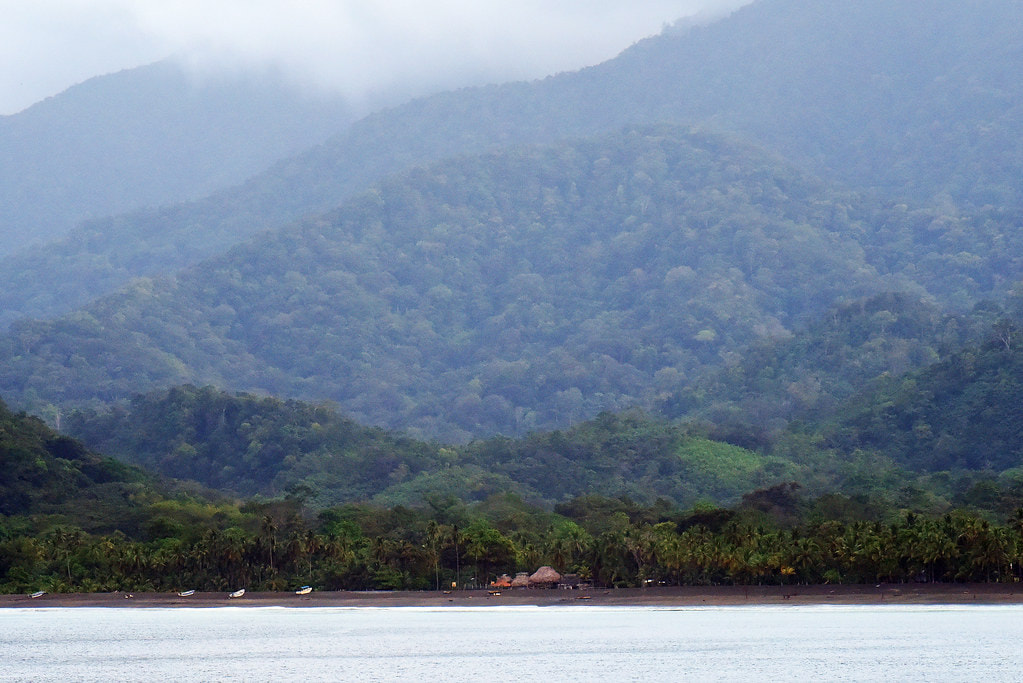 Photo of Darién National Park forest and Emberá indigenous village of Playa Muerto on the beach