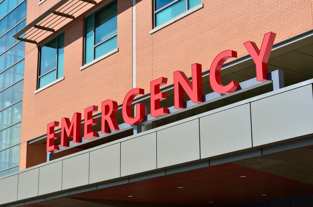 Image of a sign that reads Emergency outside of a hospital