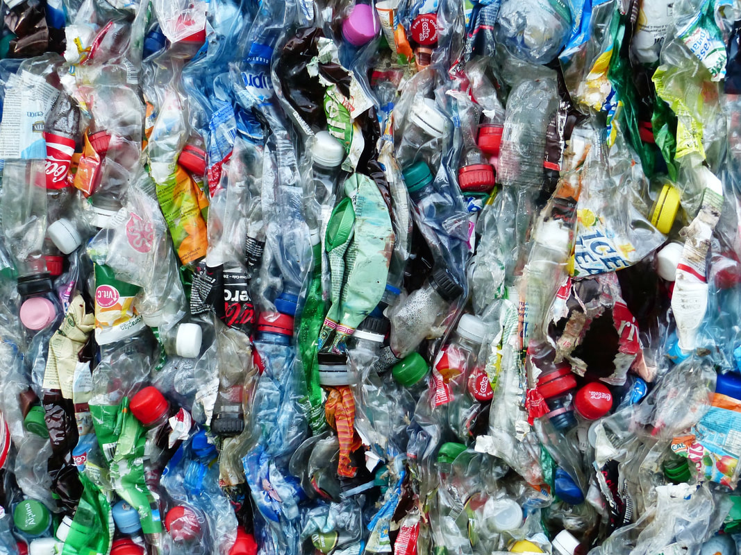 Image of crushed cans and plastic bottles