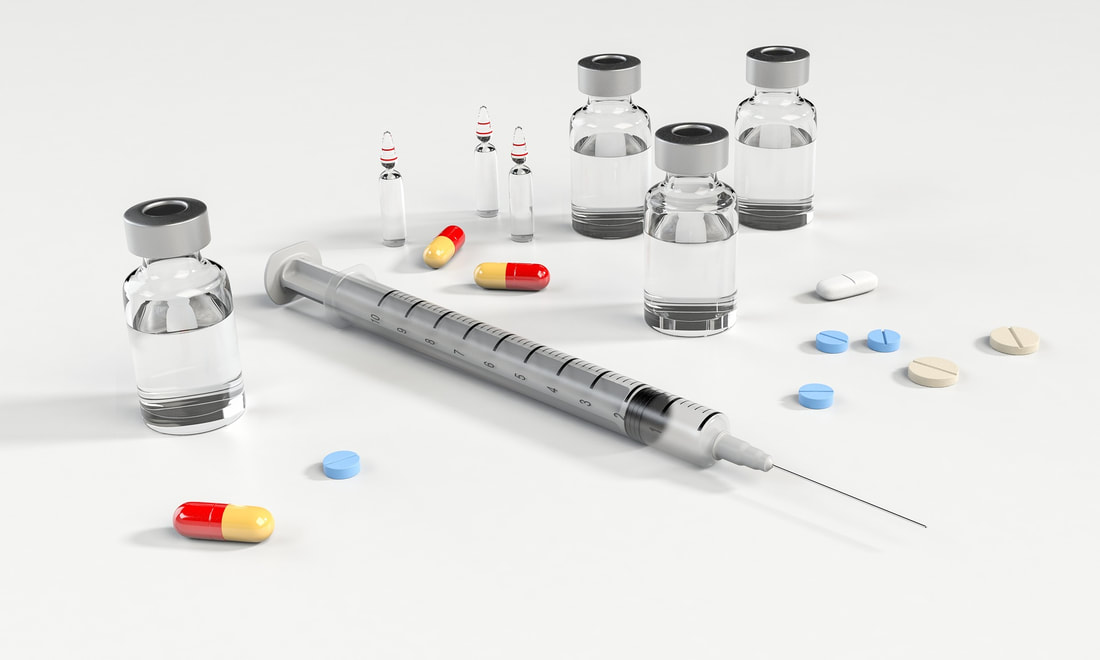 Syringe, pills, medication, vials